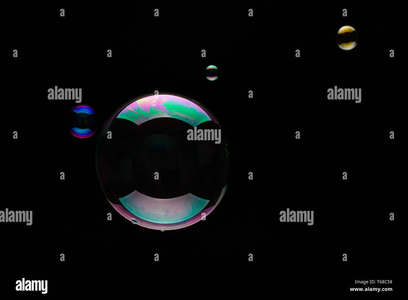 Soap Bubbles On A Black Background Stock Photo
