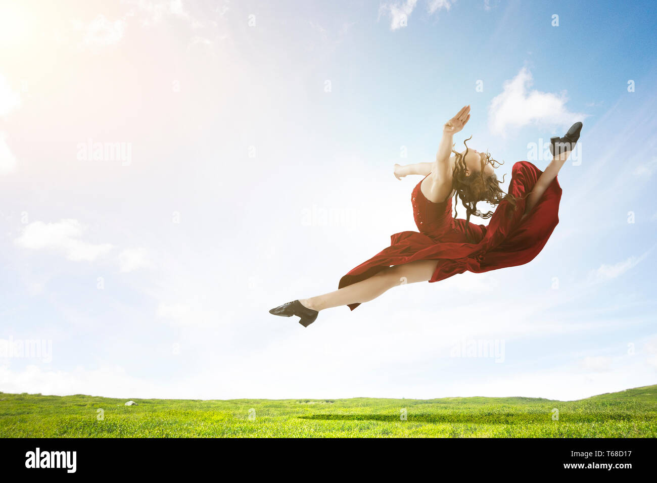 Young and beautiful female dancer in a red dress. Mixed media Stock ...