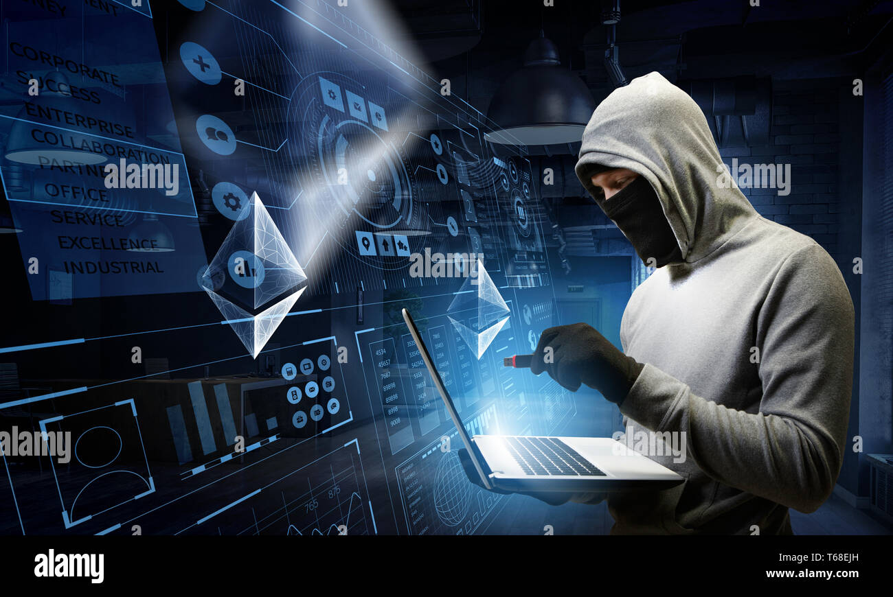 Hacker hunting for crypto currency Stock Photo - Alamy