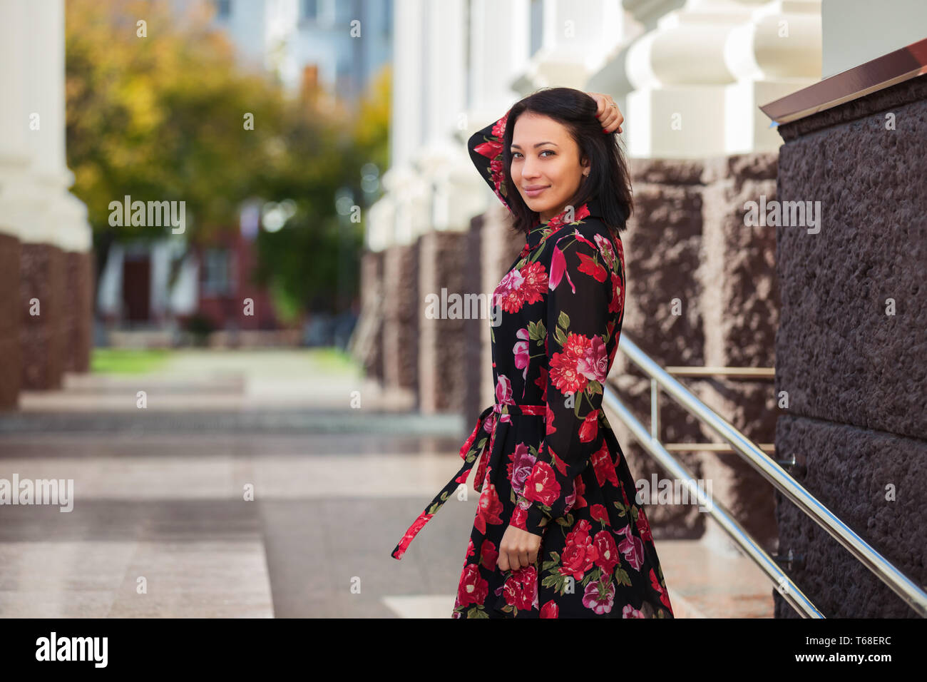 Happy young beautiful woman walking in city street Stylish fashion ...