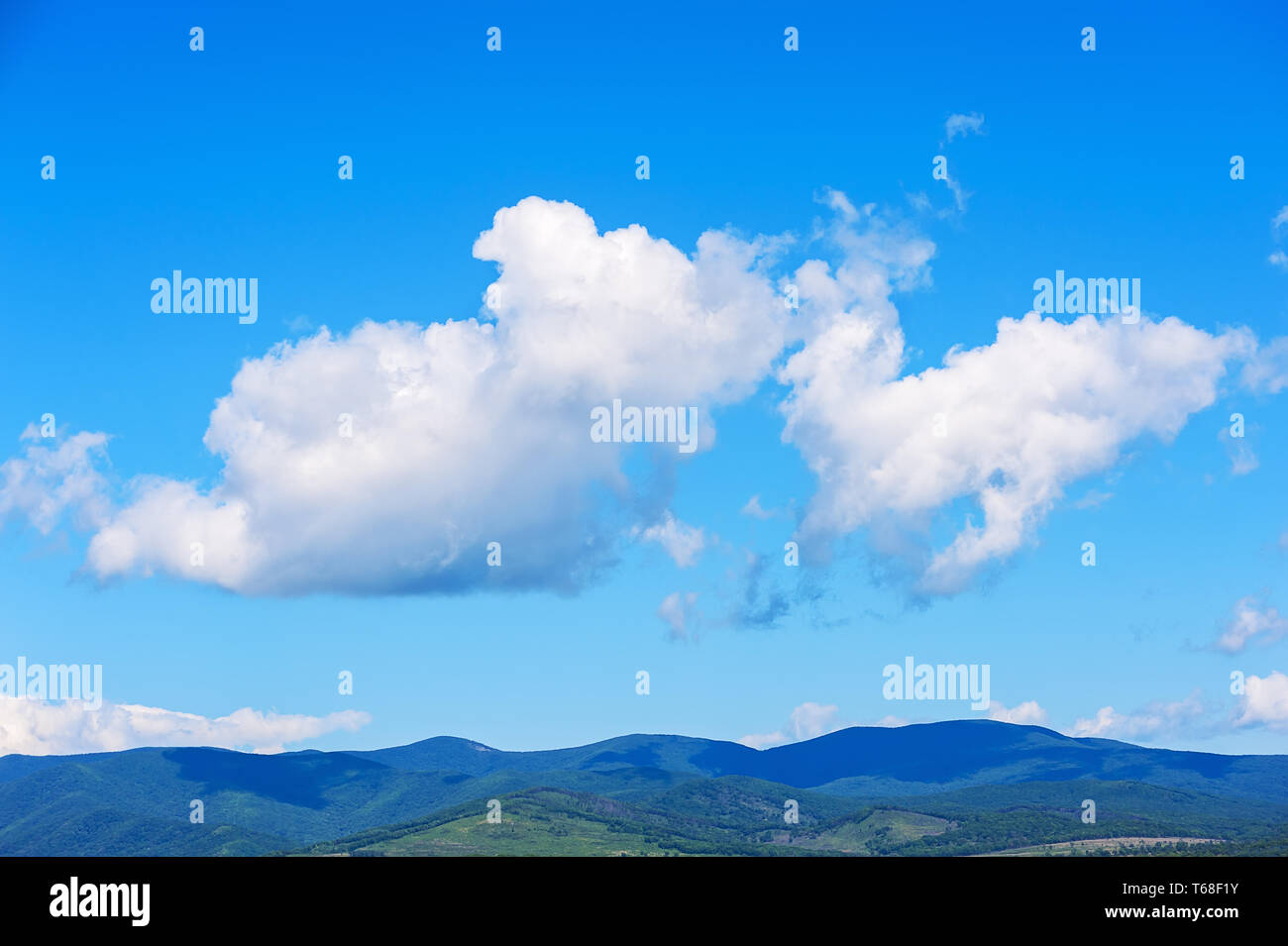 Blue sky clouds mountain landscape hi-res stock photography and images ...