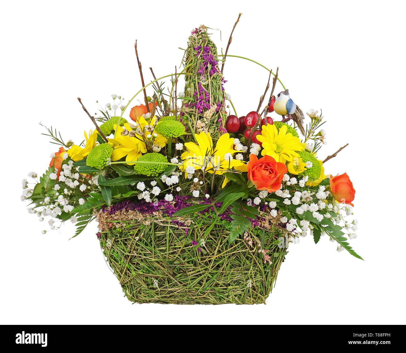 Flowers bouquet arrangement centerpiece in wicker basket. Stock Photo