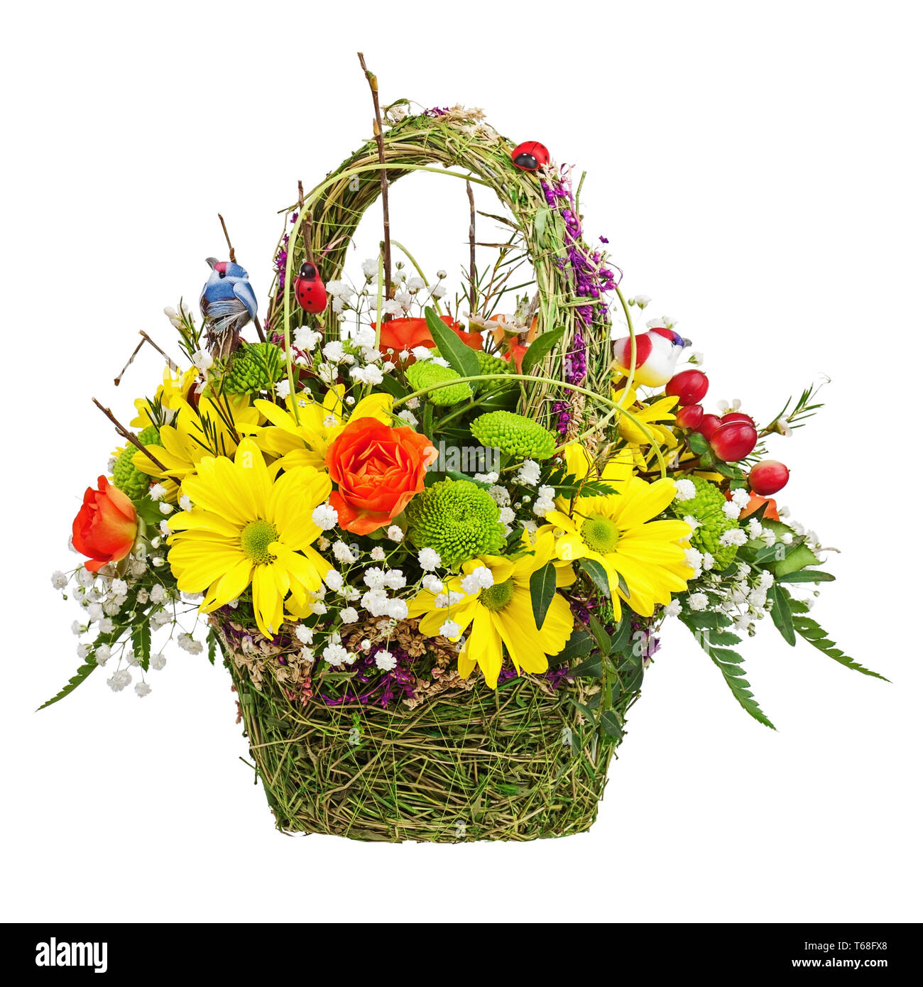 Flowers bouquet arrangement centerpiece in wicker basket. Stock Photo