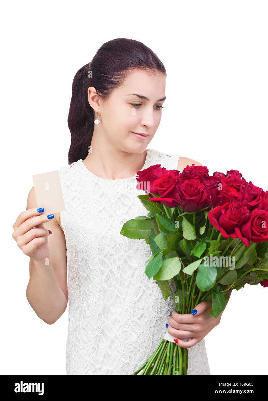 Girl with bouquet of red roses and card in hand. Stock Photo