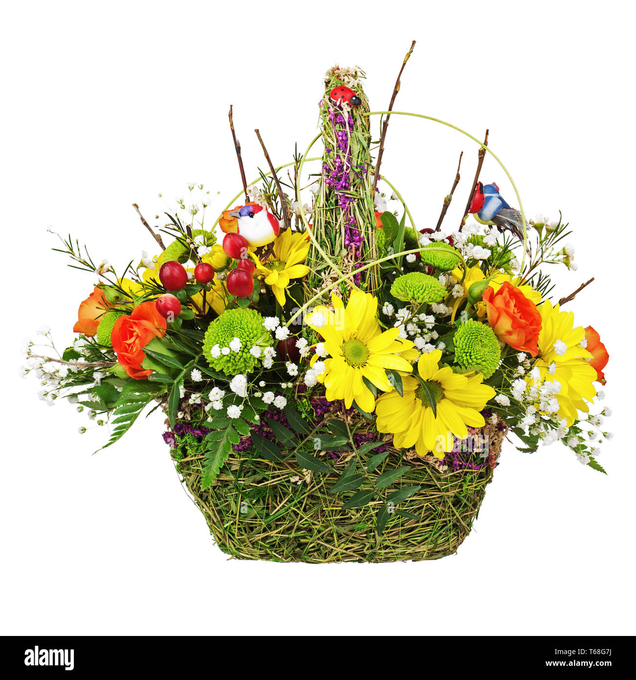 Flowers bouquet arrangement centerpiece in wicker basket Stock Photo