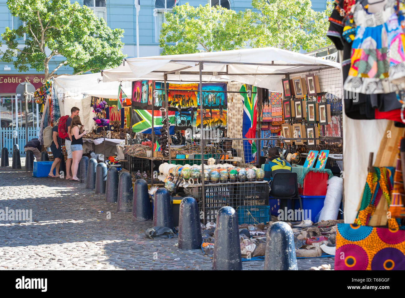 tourists or people shopping and browsing at Greenmarket Square street