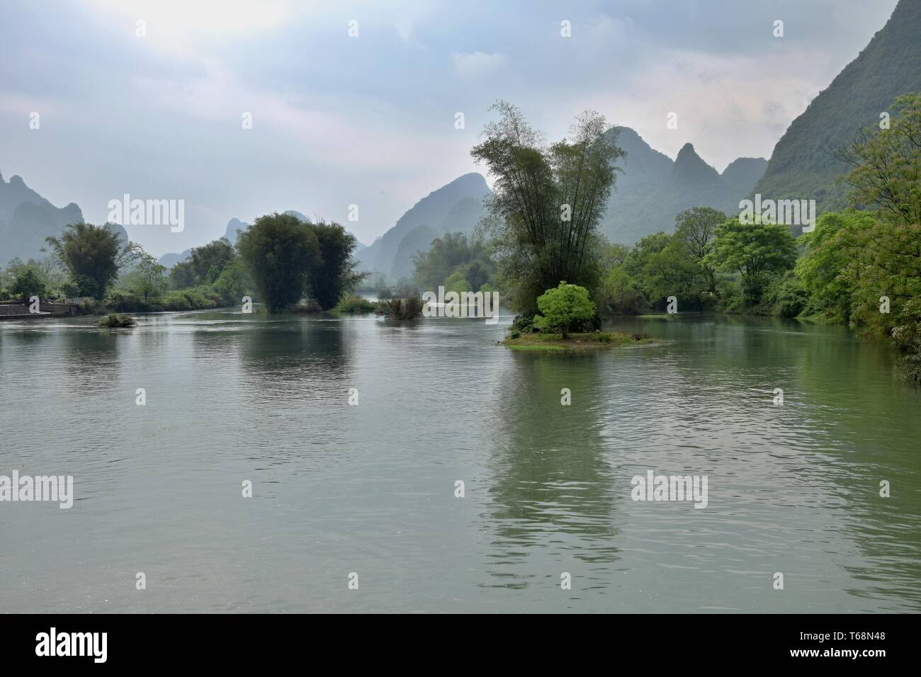 Li river runs through the fairy karst landscape of Yangshuo in Guangxi Zhuang Autonomous Region in China. Stock Photo