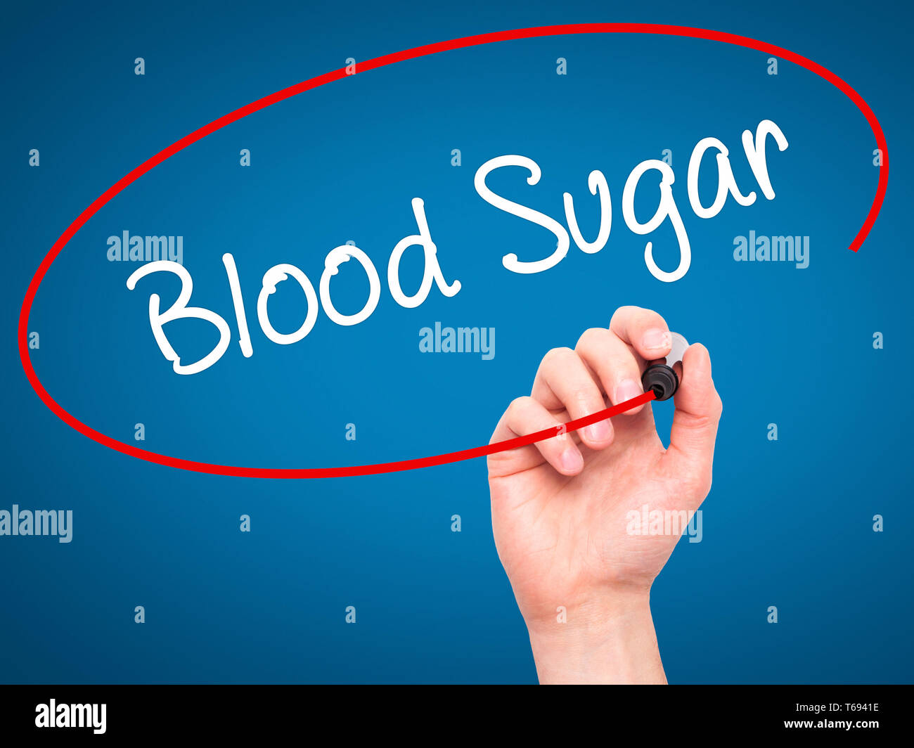 Man Hand writing Blood Sugar with black marker on visual screen