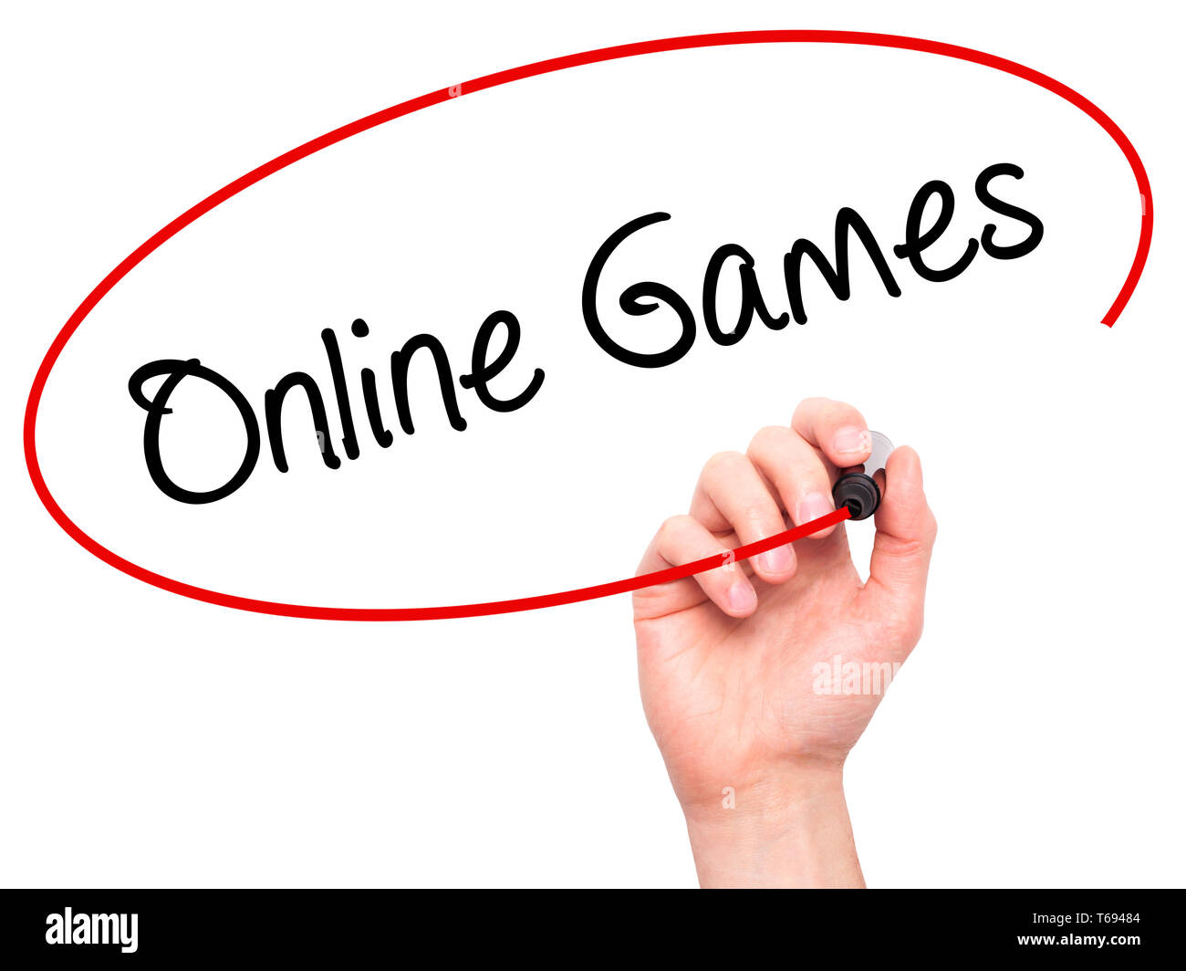 Man Hand writing Online Games with black marker on visual screen Stock Photo