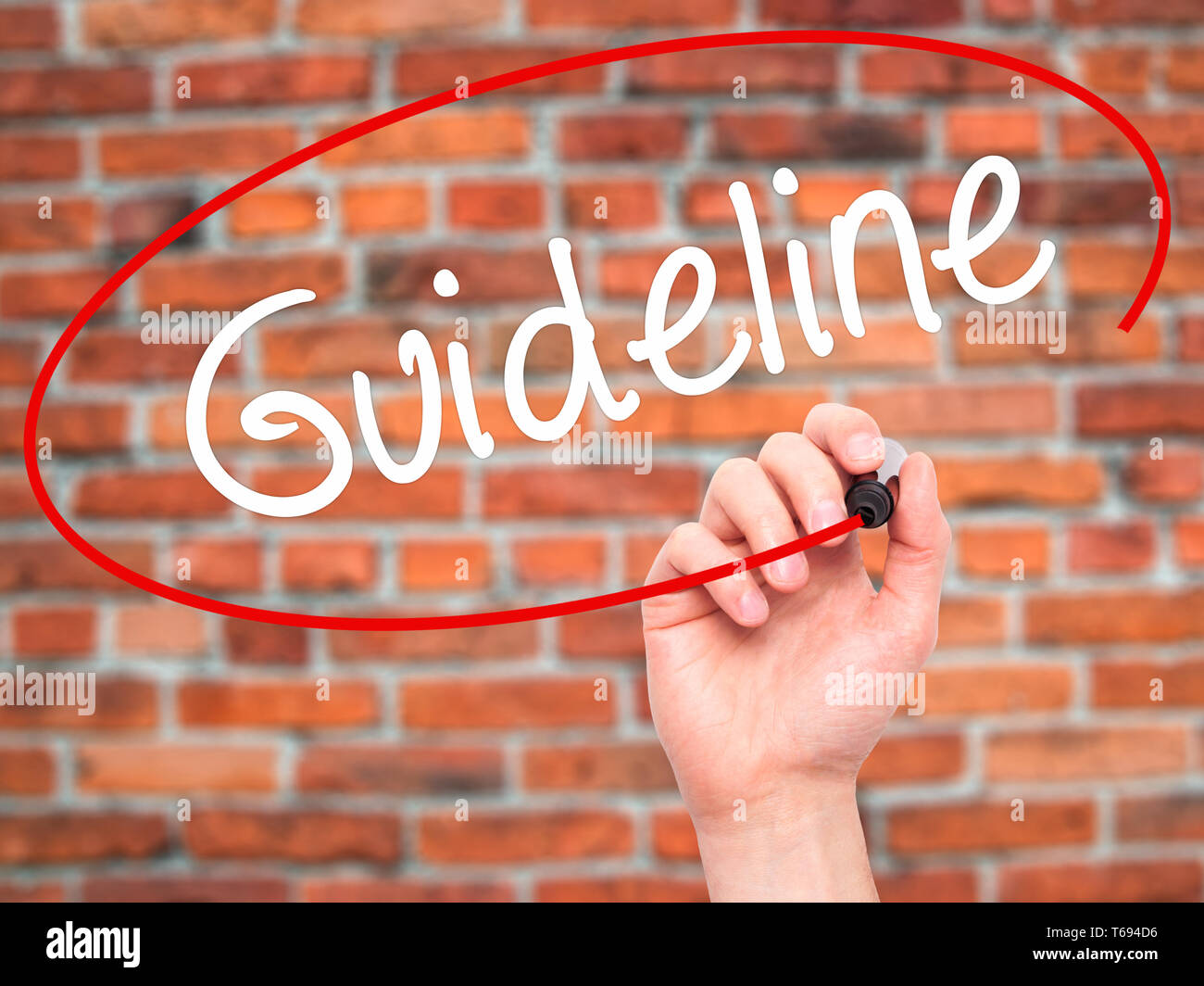 Man Hand writing Guideline with black marker on visual screen Stock ...