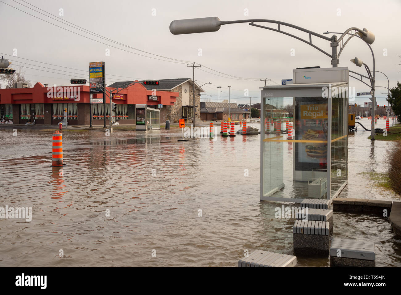 Pierrefonds-Roxboro, Quebec, Canada - 29 April 2019: Street submerged during spring floods Stock Photo