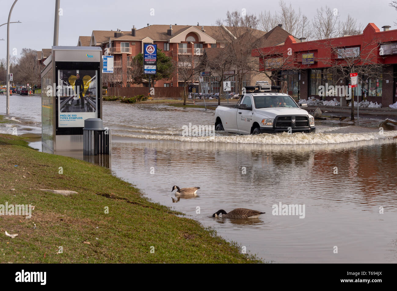 PierrefondsRoxboro, Quebec, Canada 29 April 2019 Street submerged