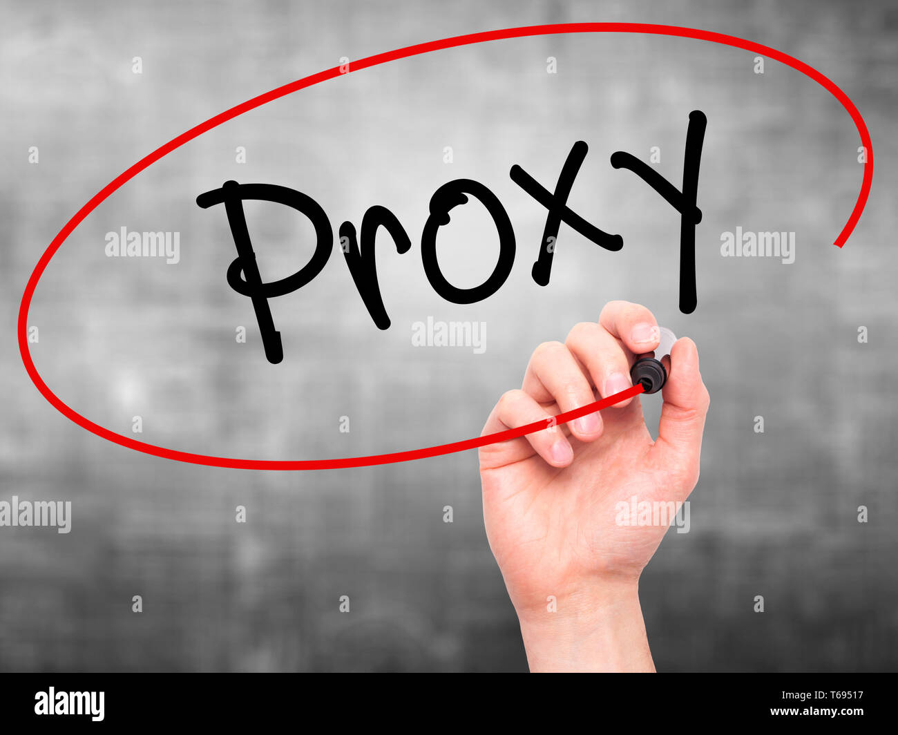 Man Hand writing Proxy with black marker on visual screen. Stock Photo