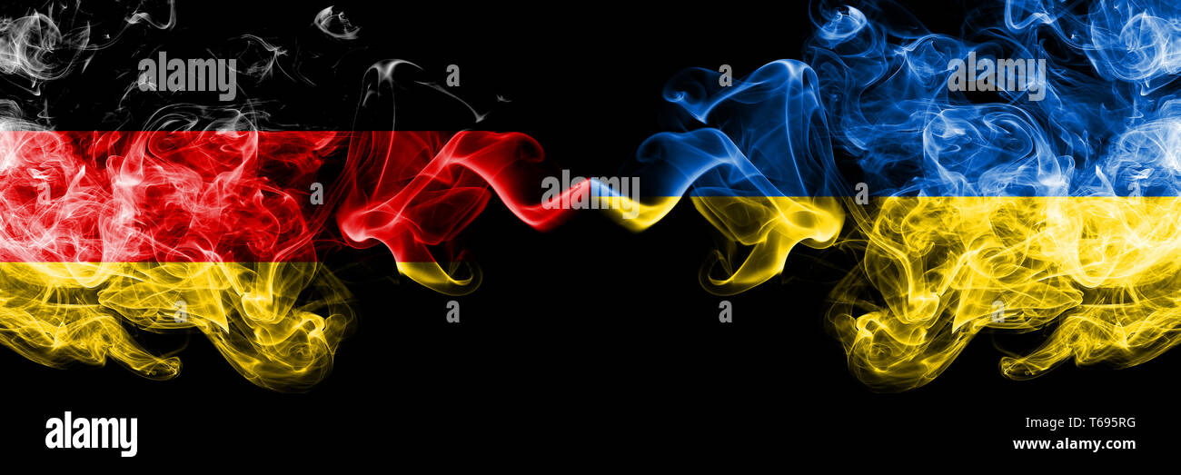 Germany Vs Ukraine Ukrainian Smoky Mystic Flags Placed Side By Side Thick Colored Silky Smoke Flags Of Deutschland And Ukraine Ukrainian Stock Photo Alamy