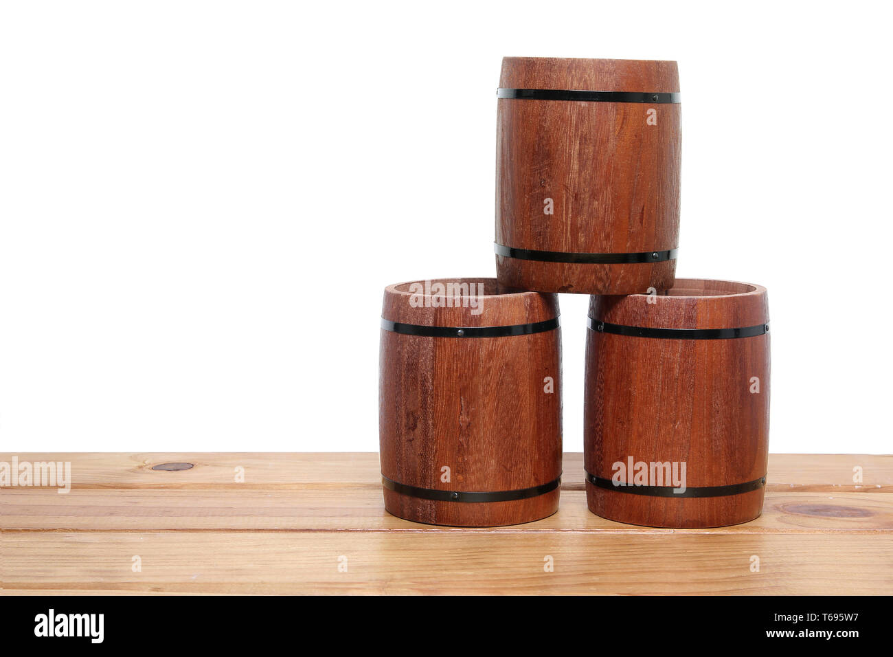 Miniature Wine Barrels on Wooden Background Stock Photo