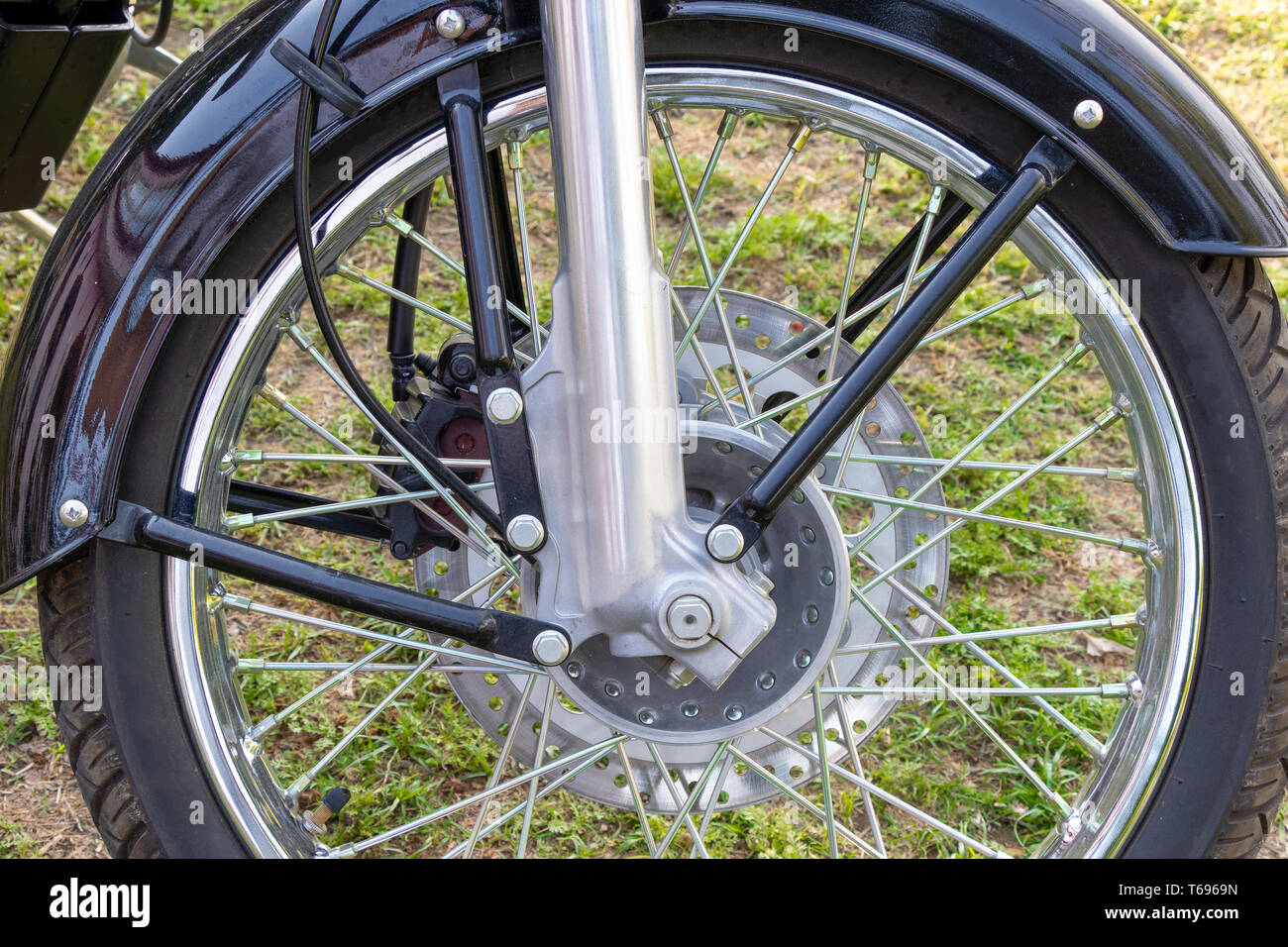 Bike front disc brake close up view from right side, motorbike or