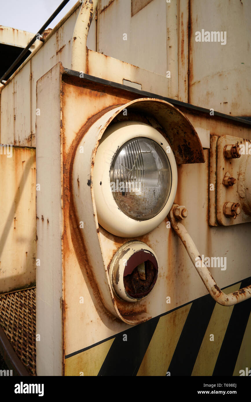 headlights of an old locomotive in the port of Magdeburg Stock Photo