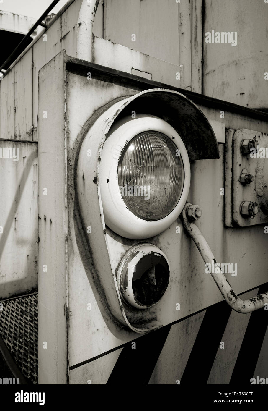 headlights of an old locomotive in the port of Magdeburg Stock Photo