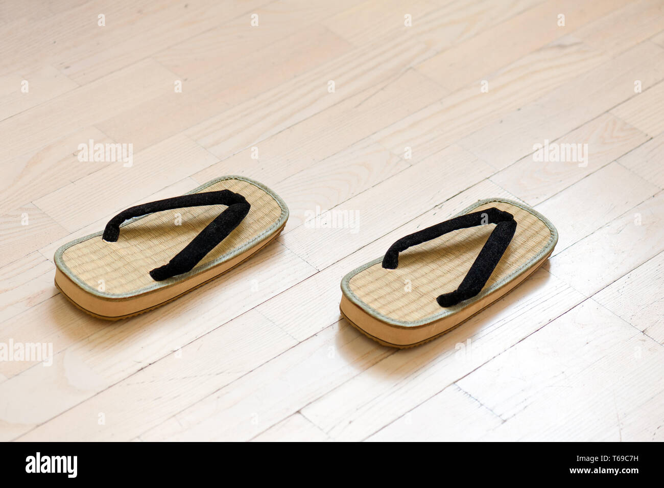 Pair of Traditional Japanese Sandals on Old Wooden Floor Stock Photo ...