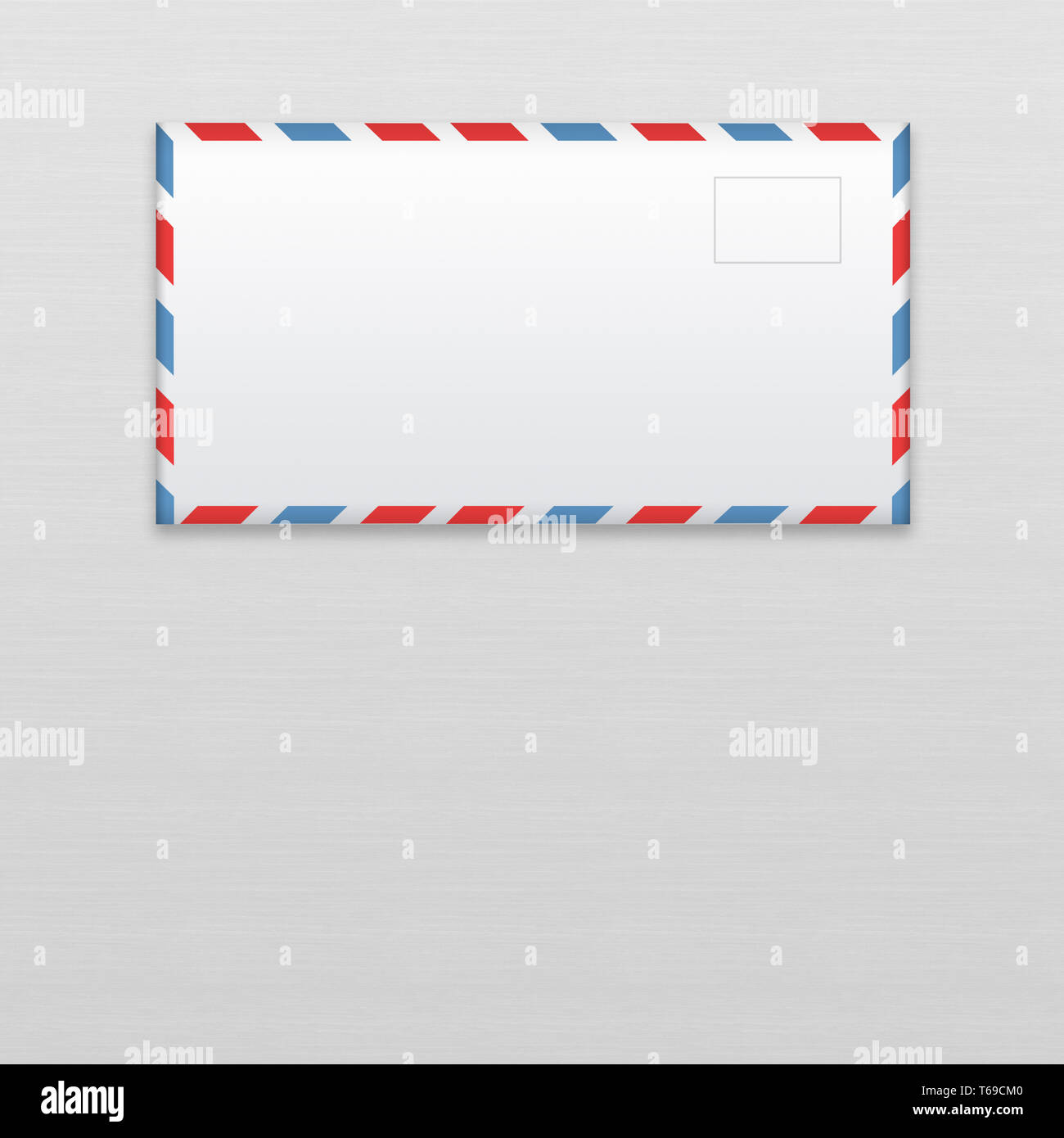 Post envelope on gray wooden background. Stock Photo