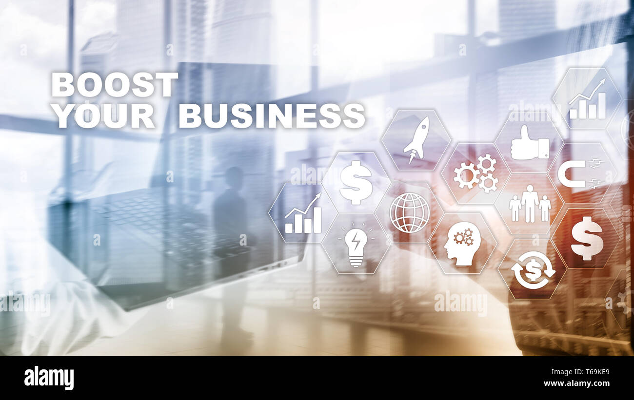 Financial and Technology concept. On a virtual screen inscription: Boost Your Business. Stock Photo