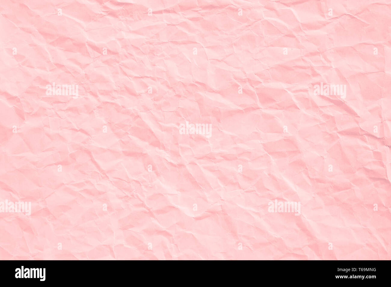 Rose Quartz crumpled paper texture Stock Photo