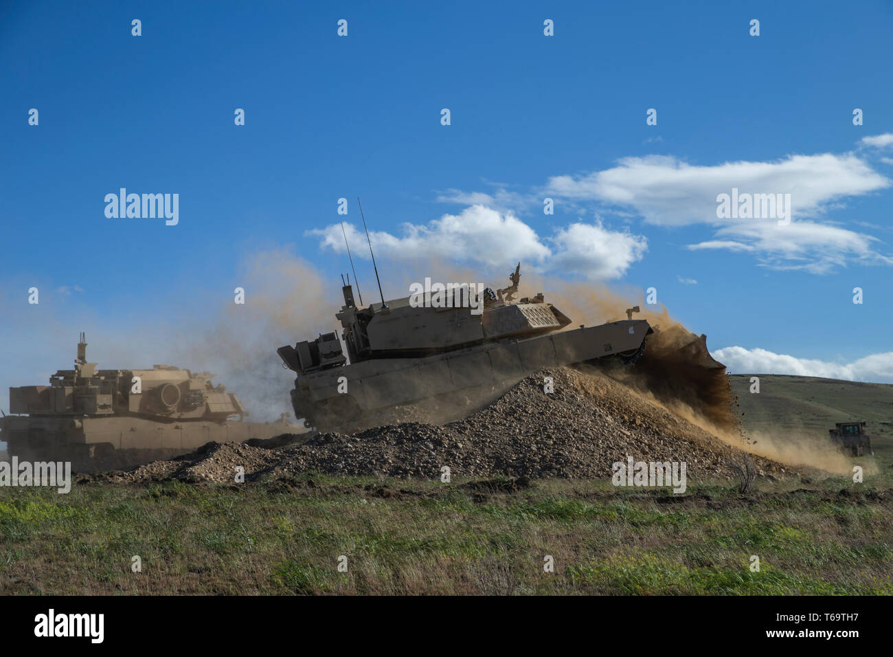 U.S. Marines with 2nd Combat Engineer Battalion, 2nd Marine Division conduct breaches autonomously with Assault Breacher Vehicles during the Robotic Complex Breach Concept (RCBC) on Yakima Training Center in Yakima, Washington, April 27, 2019. RCBC allows the military to utilize autonomous systems that provide increased awareness on the modernization of the equipment. (U.S. Marine Corps photo by Lance Cpl. Nathaniel Q. Hamilton) Stock Photo