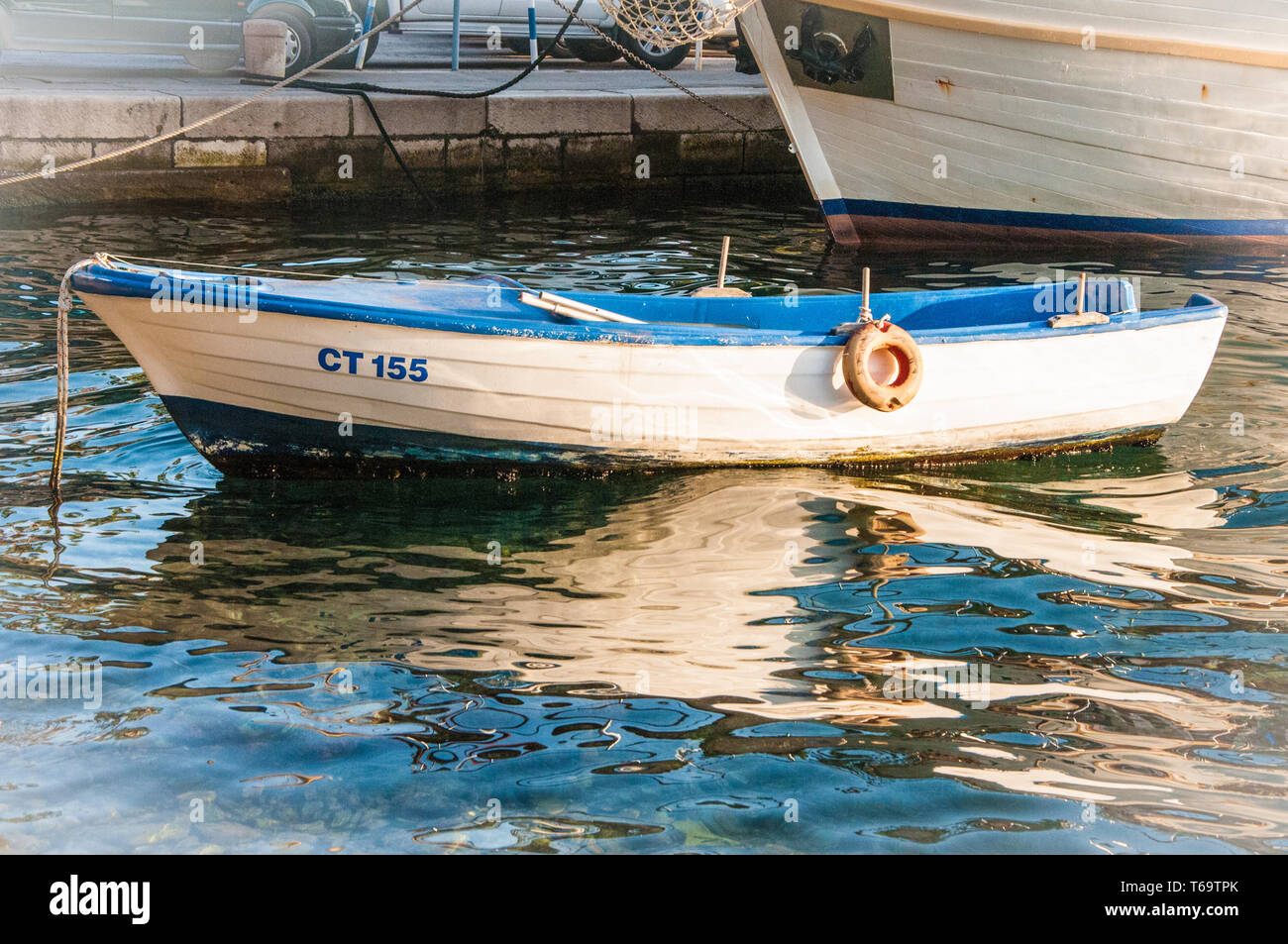 Row Boat in Cavtat harbor Stock Photo