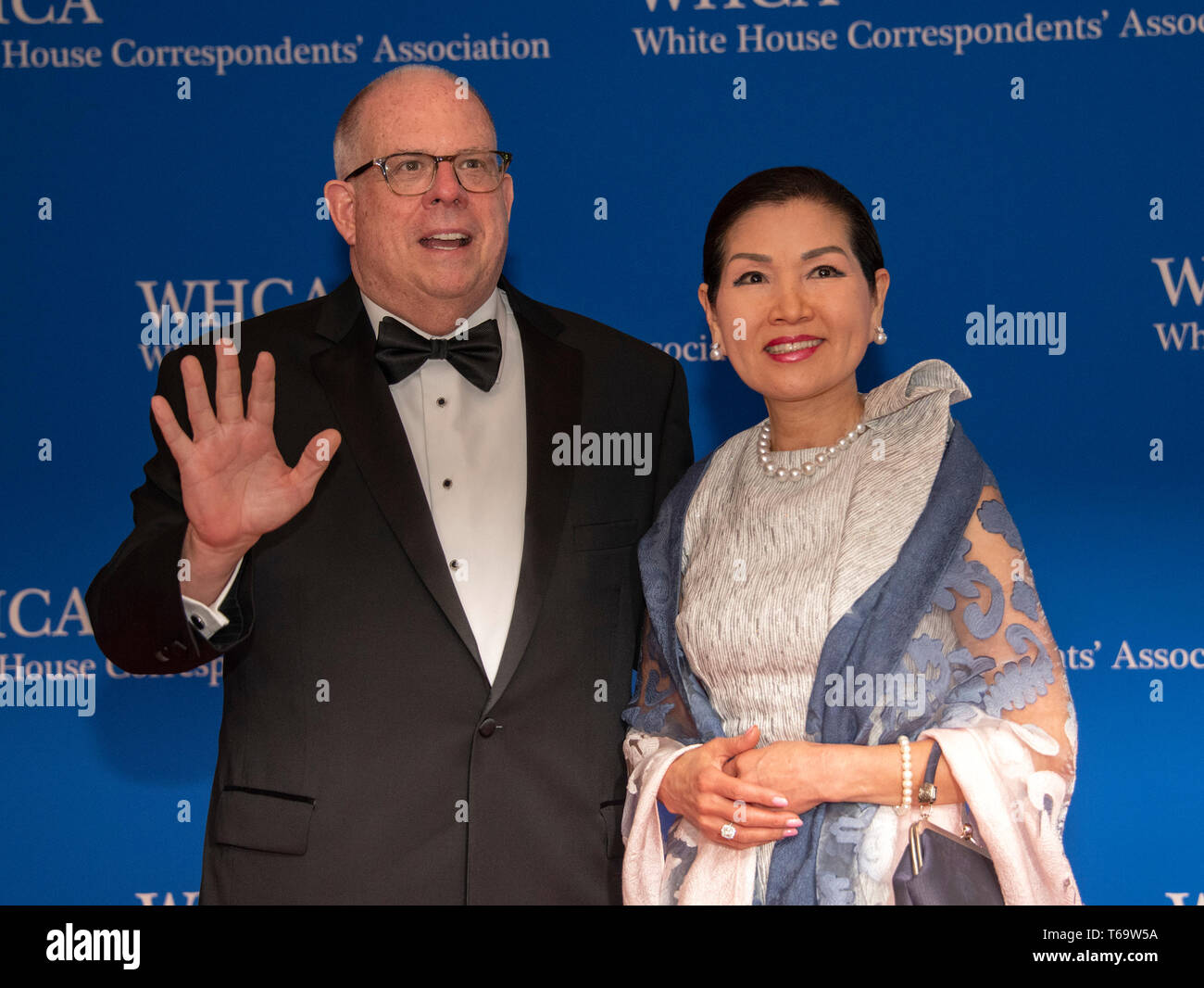 Governor Larry Hogan (Republican of Maryland) and his wife, Yumi, arrive for the 2019 White House Correspondents Association Annual Dinner at the Washington Hilton Hotel on Saturday, April 27, 2019. Credit: Ron Sachs/CNP (RESTRICTION: NO New York or New Jersey Newspapers or newspapers within a 75 mile radius of New York City) | usage worldwide Stock Photo