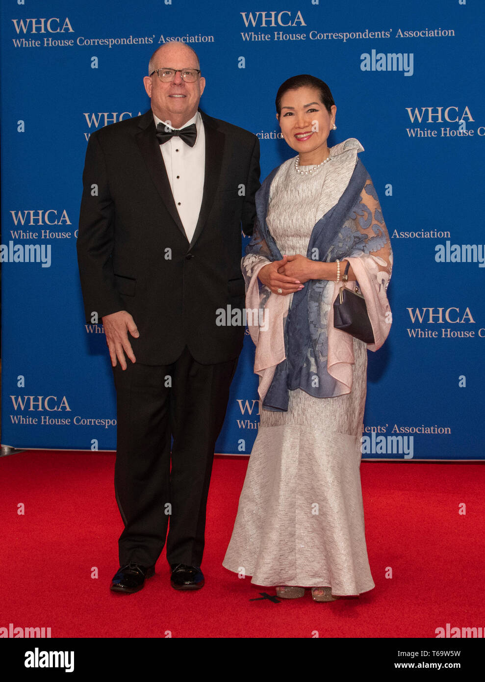 Governor Larry Hogan (Republican of Maryland) and his wife, Yumi, arrive for the 2019 White House Correspondents Association Annual Dinner at the Washington Hilton Hotel on Saturday, April 27, 2019. Credit: Ron Sachs/CNP (RESTRICTION: NO New York or New Jersey Newspapers or newspapers within a 75 mile radius of New York City) | usage worldwide Stock Photo