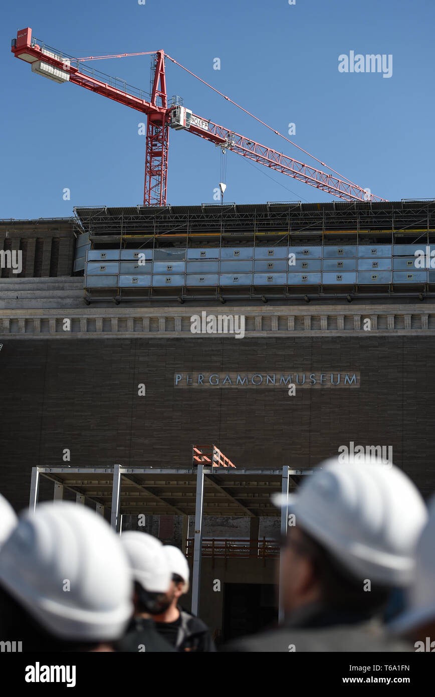 Berlin, Germany. 30th Apr, 2019. Journalists are standing in front of the Tempietto (centrally located entrance) on the construction site of the Pergamon Museum. On 03.05.2019 the topping-out ceremony for construction section A is to be celebrated. Credit: Sven Braun/dpa/Alamy Live News Stock Photo