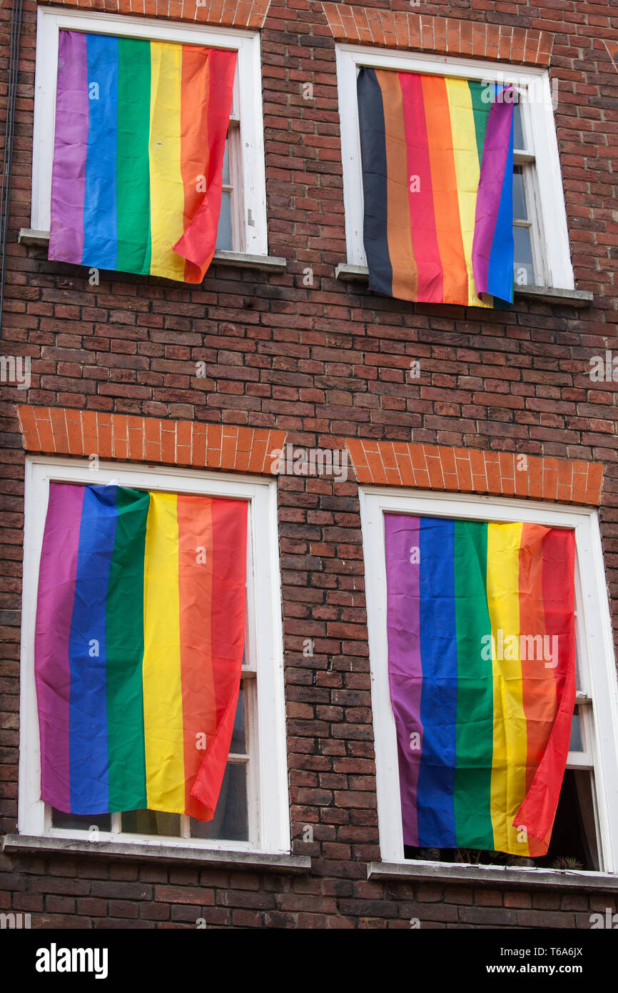 London, UK. 30th April 2019. The Admiral Duncan pub in Old Compton Street, Soho, is decorated with rainbow flags, or LGBT pride flags, for an event involving survivors of the Admiral Duncan bombing, families and friends of the victims and the LGBTQ community to mark 20 years since the attack. Three people were killed and 79 injured when a bomb packed with up to 1,500 four-inch nails was detonated by a neo-Nazi at the Admiral Duncan on 30th April 1999. Credit: Mark Kerrison/Alamy Live News Stock Photo