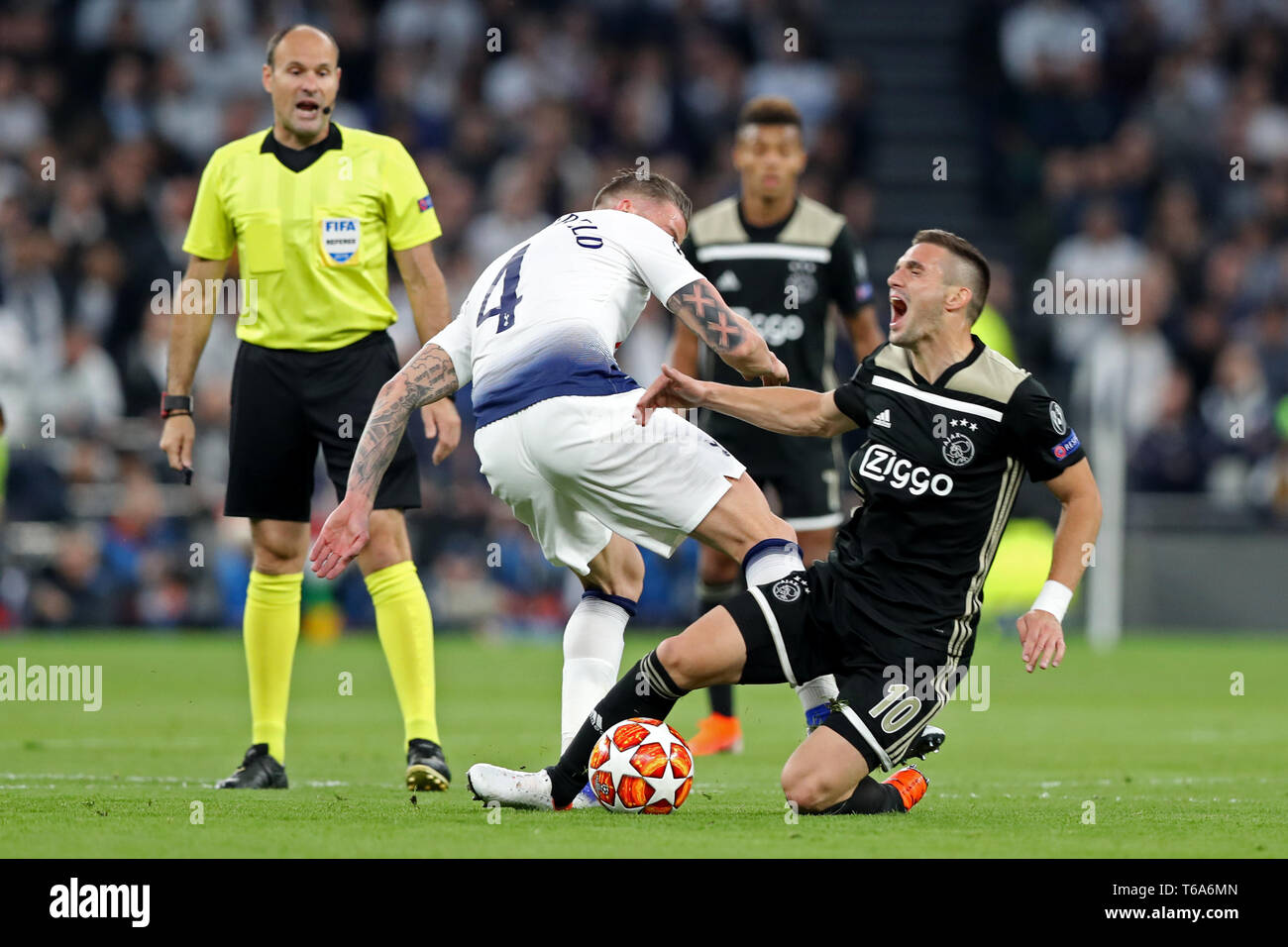 London, UK. 30th Apr 2019. Ajax forward Dusan Tadic is tackled by Tottenham defender Toby Alderweireld during the UEFA Champions League match between Tottenham Hotspur and Ajax Amsterdam at White Hart Lane, London on Tuesday 30th April 2019. (Credit: Jon Bromley | MI News) Credit: MI News & Sport /Alamy Live News Stock Photo