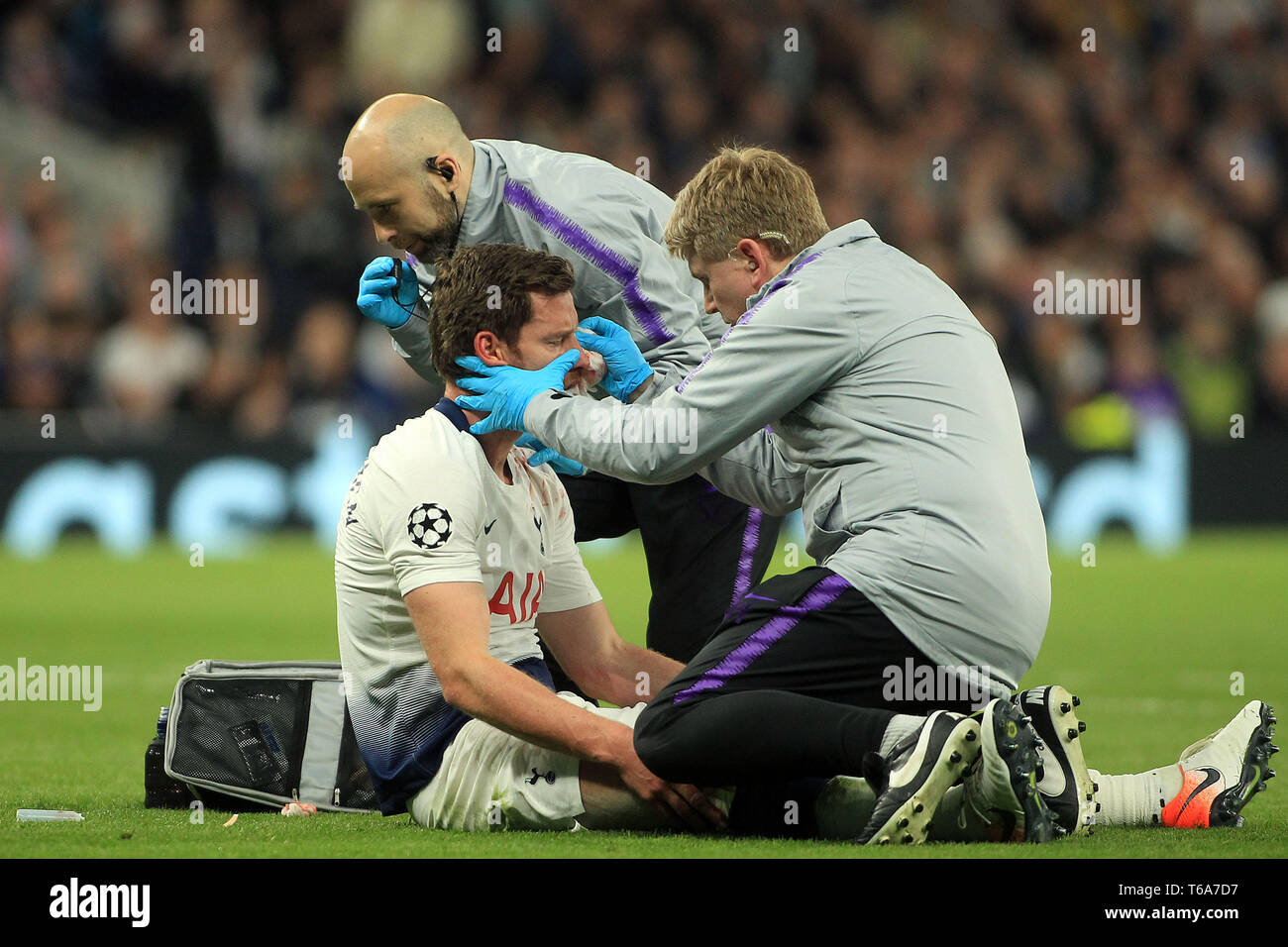 London, UK. 30th Apr, 2019. Jan Vertonghen of Tottenham Hotspur receives treatment after colliding with his team mate Toby Alderweireld and Andre Onana of Ajax. UEFA Champions league match, semi- final, 1st leg match , Tottenham Hotspur v Ajax at The Tottenham Hotspur Stadium in London on Tuesday 30th April 2019.  this image may only be used for Editorial purposes. Editorial use only, license required for commercial use. No use in betting, games or a single club/league/player publications . Credit: Andrew Orchard sports photography/Alamy Live News Stock Photo