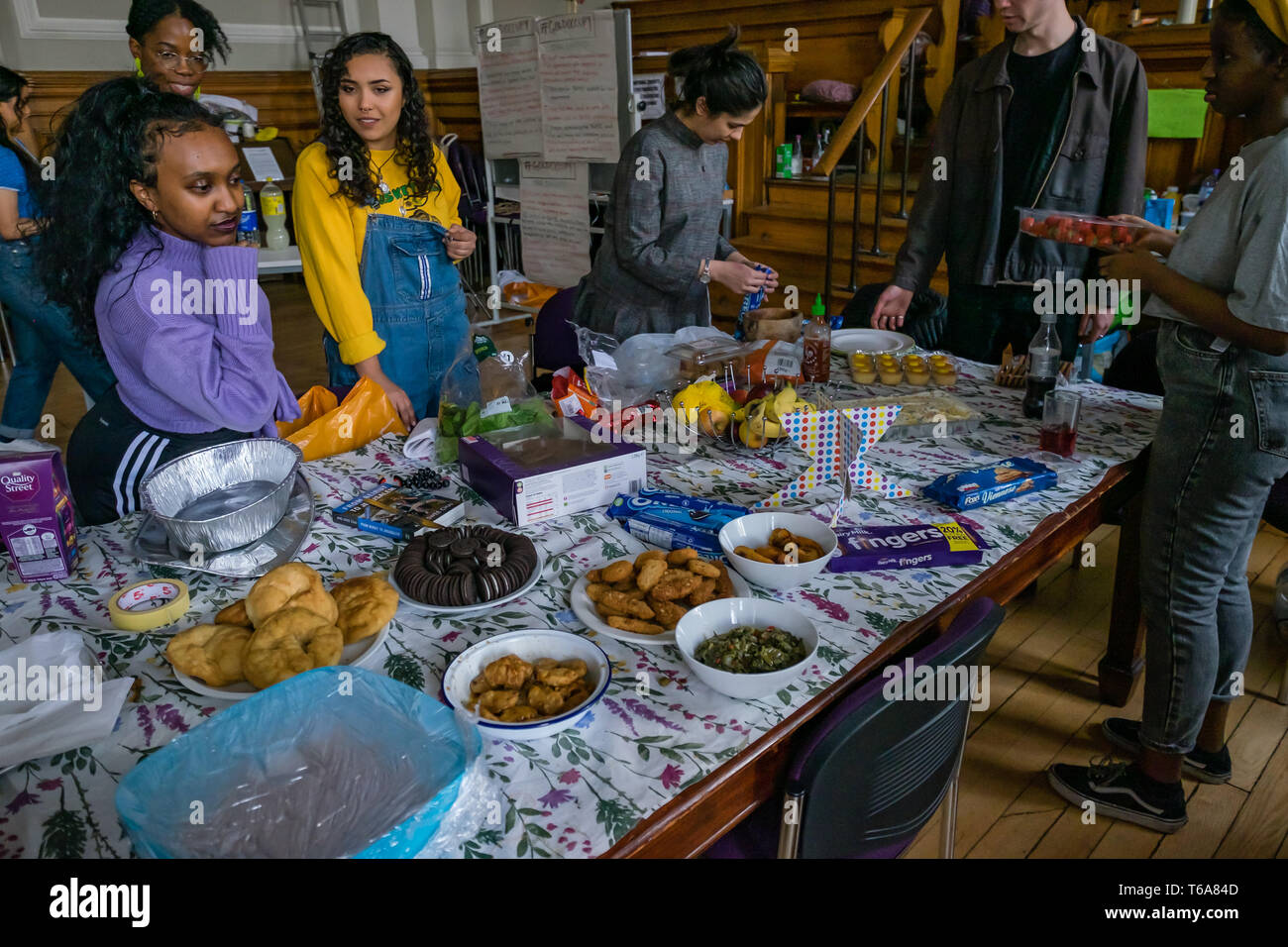 London, UK. 30th April 2018. Goldsmiths Anti-Racist Action celebrate 50 days of occupation of the management building, the former Deptford Town Hall and prepare food for a party. The occupation began when the university failed to respond adequately to racist abuse of a candidate in the student elections. Students claim the university fails to treat BAME students and workers fairly, and among other demands insist Goldsmiths produces a strategic plan to tackle racism. Credit: Peter Marshall/Alamy Live News Stock Photo
