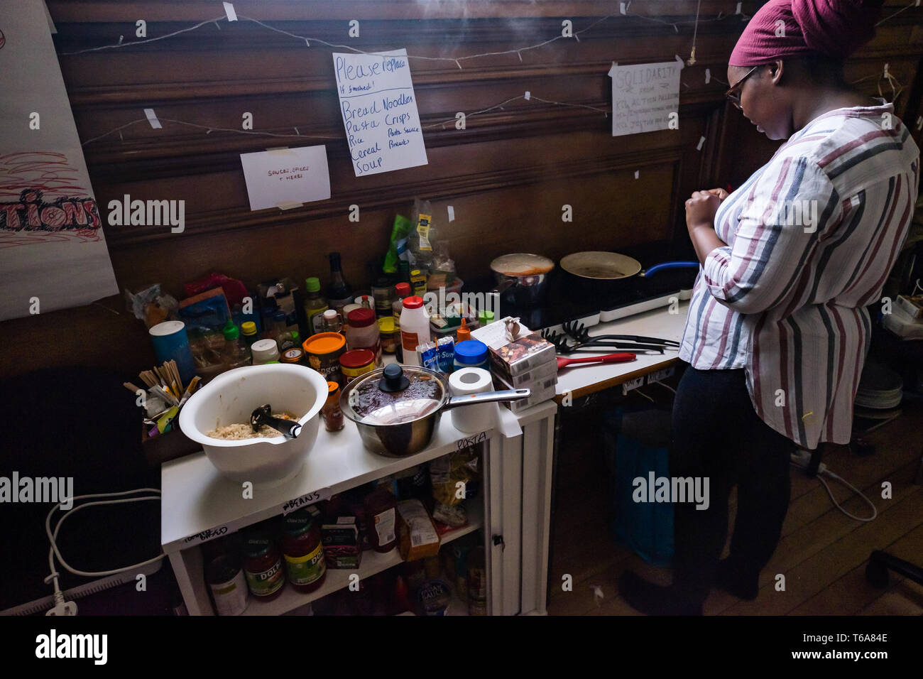 London, UK. 30th April 2018. Goldsmiths Anti-Racist Action celebrate 50 days of occupation of the management building, the former Deptford Town Hall and prepare food for a party. The occupation began when the university failed to respond adequately to racist abuse of a candidate in the student elections. Students claim the university fails to treat BAME students and workers fairly, and among other demands insist Goldsmiths produces a strategic plan to tackle racism. Credit: Peter Marshall/Alamy Live News Stock Photo