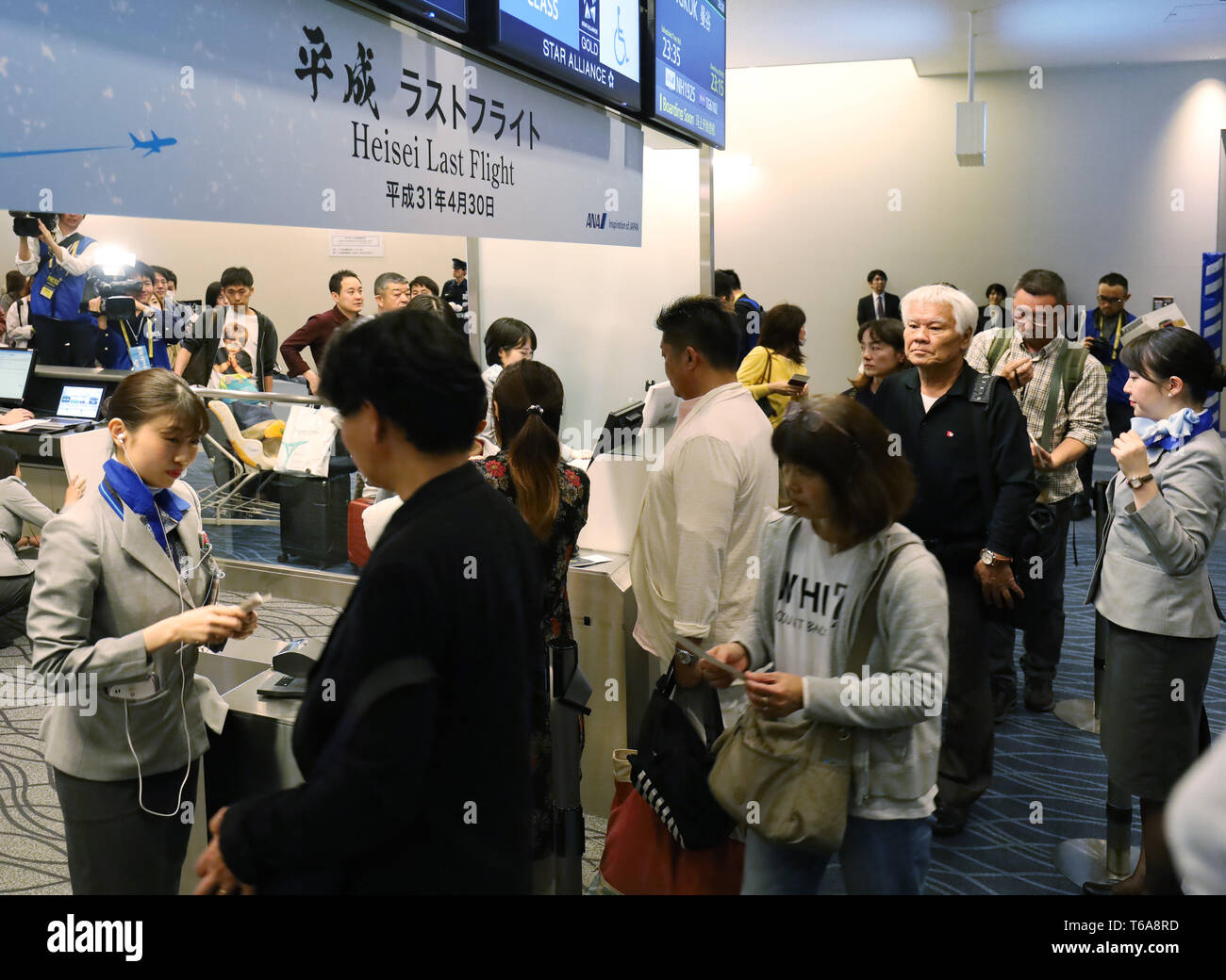 Tokyo, Japan. 30th Apr, 2019. Passengers check in All Nippon Airways