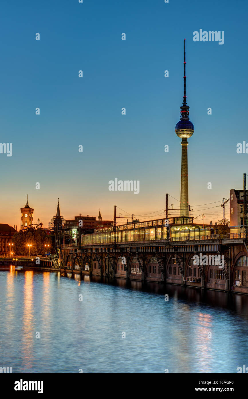 Sunset at the river Spree in Berlin with the TV Tower Stock Photo