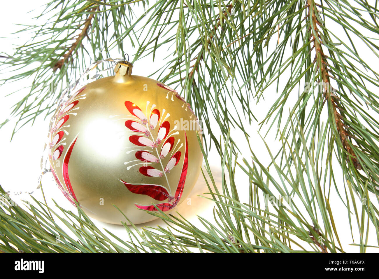 Christmas Tree and Bauble. Isolated on white Stock Photo - Alamy