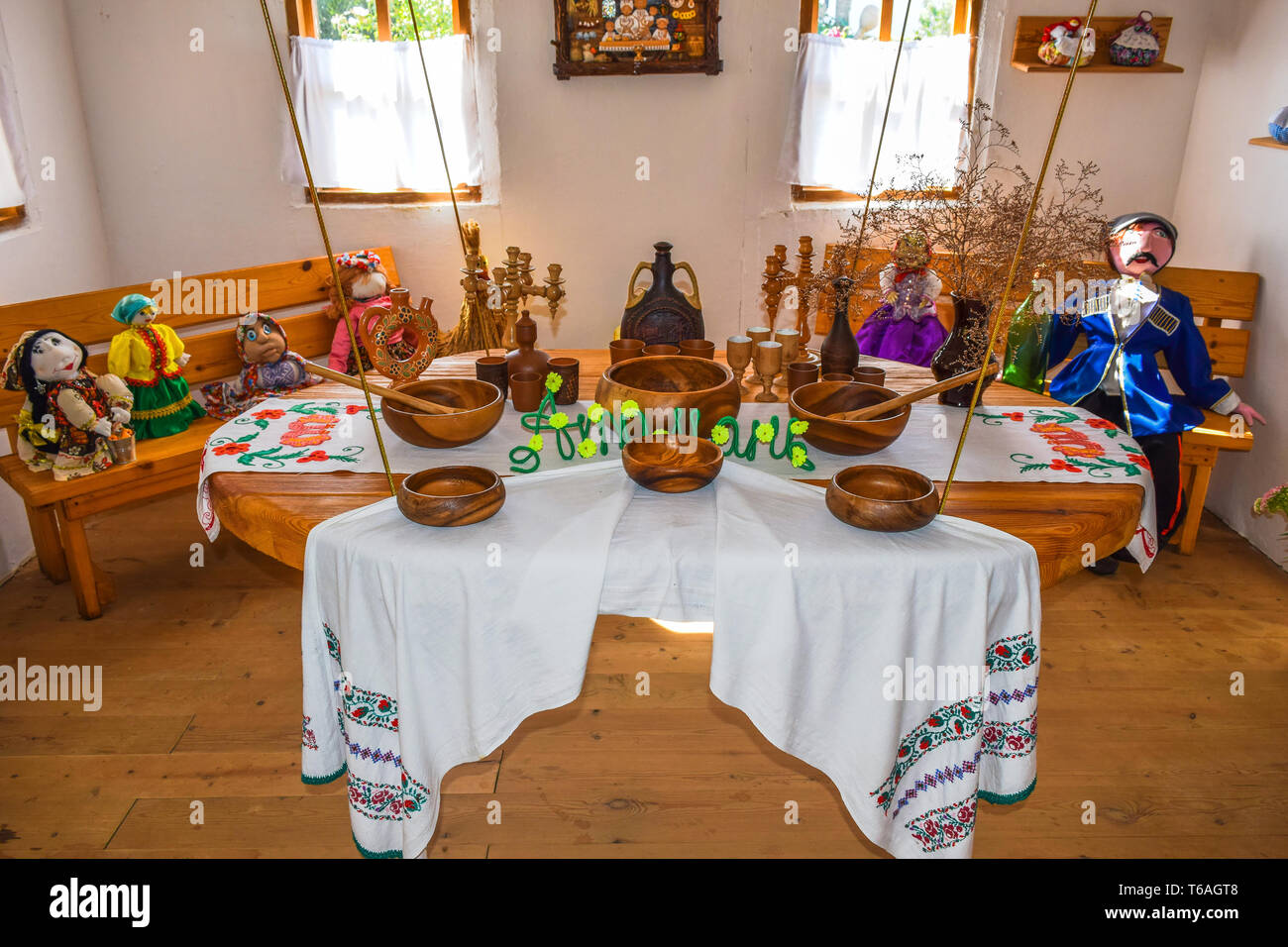 Set the table with utensils, plates and cups Stock Photo