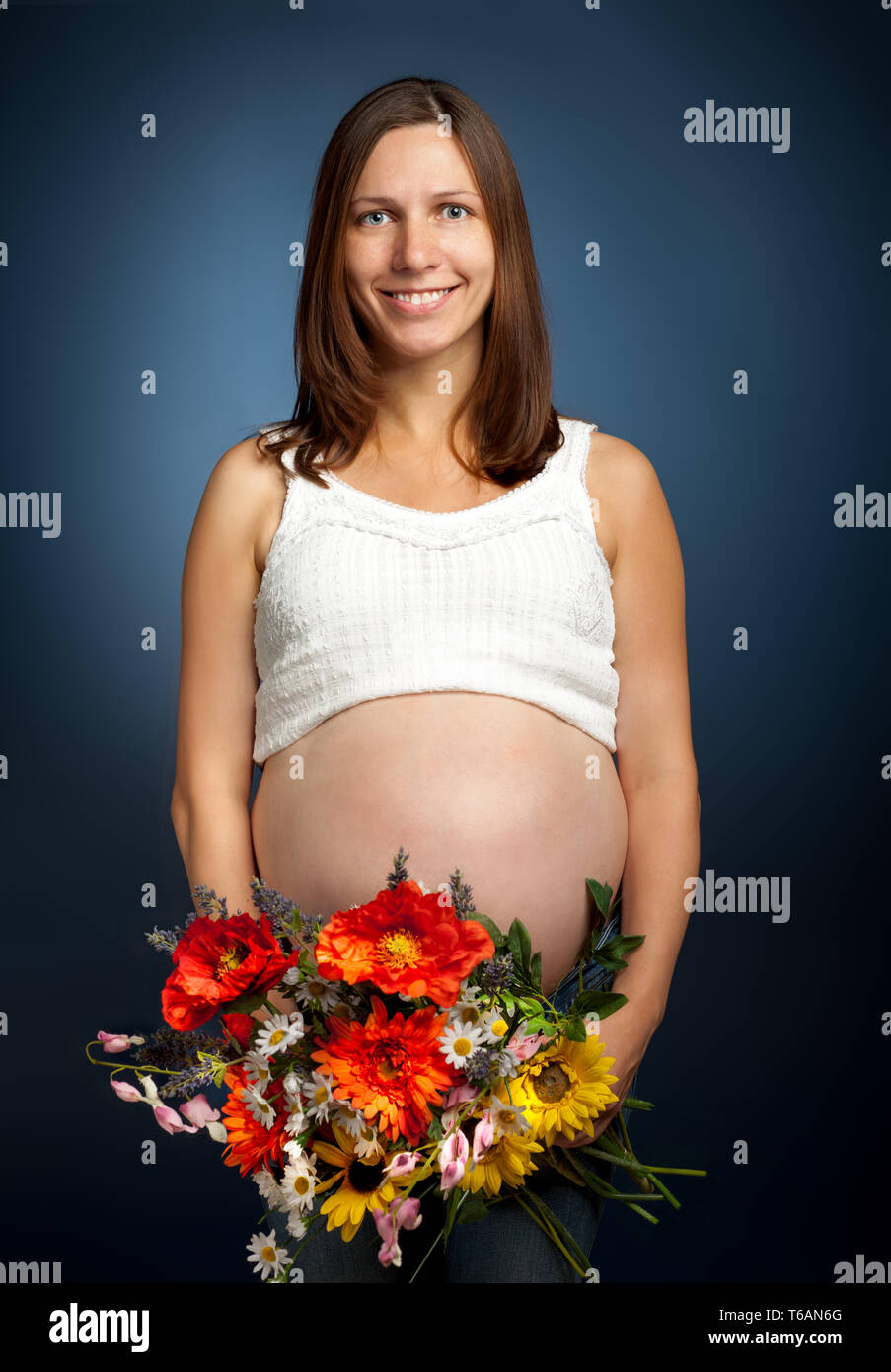 Beautiful young pregnant woman Stock Photo
