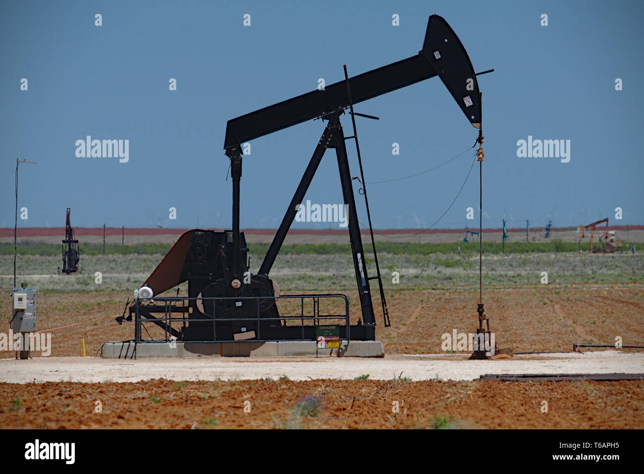 Black pumping Unit in Midland County, west Texas. Stock Photo