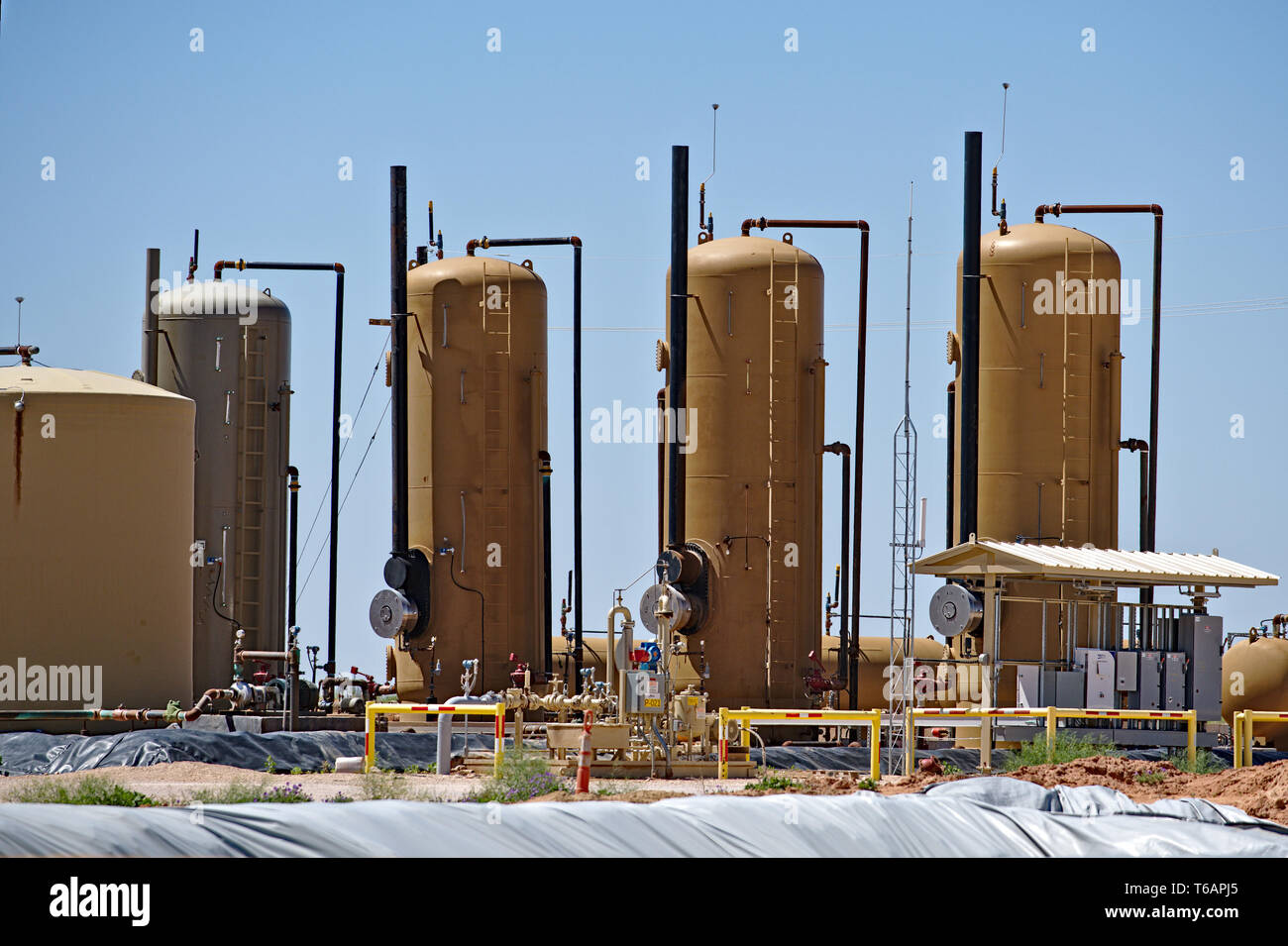 Midland County, Texas USA - 21 April 2019 : Gas separator tanks at a tank  battery in the Permian Basin oilfield Stock Photo - Alamy