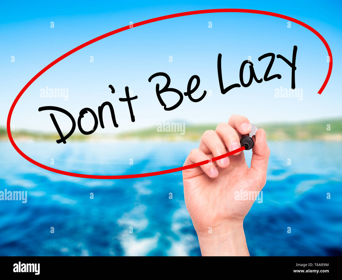 Man Hand writing Don't Be Lazy with black marker on visual screen Stock ...