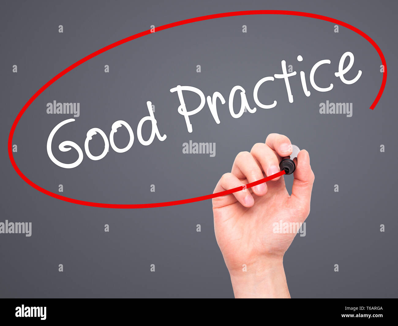 Man Hand writing Good Practice with black marker on visual screen. Stock Photo