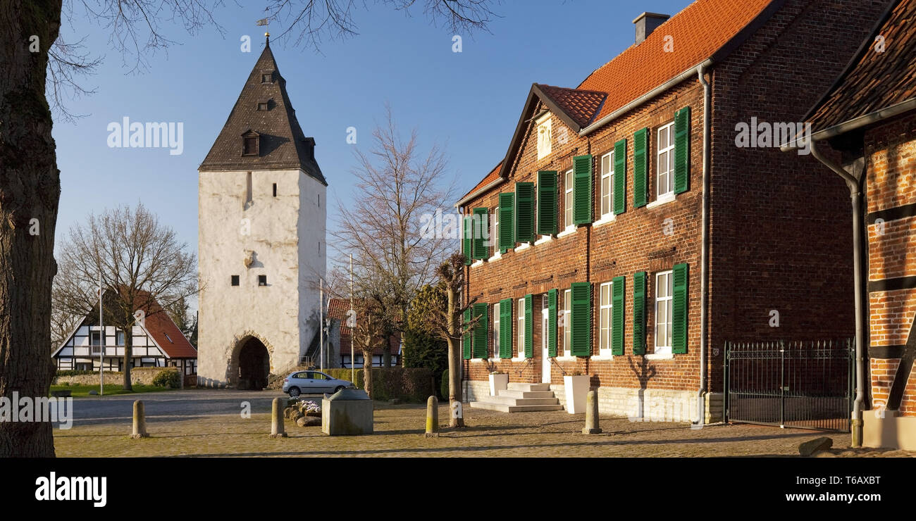 tower Paulusturm and houses on the square Burgplatz, Oelde-Stromberg North Rhine-Westphalia, Germany Stock Photo