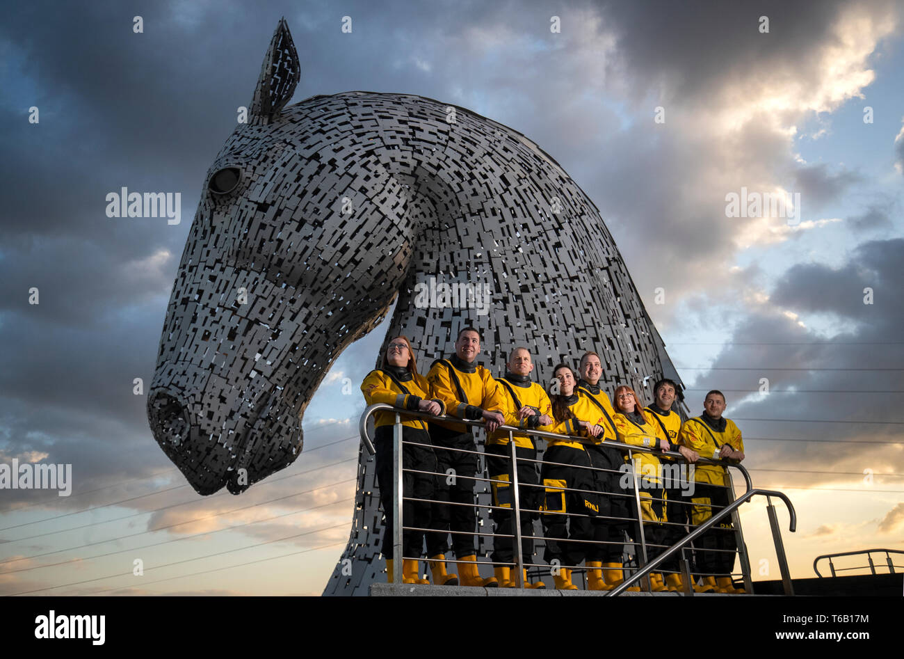Members of the Kinghorn and Queensferry crews help launch the RNLI's 2019 Mayday campaign in front of The Kelpies, Falkirk. Stock Photo