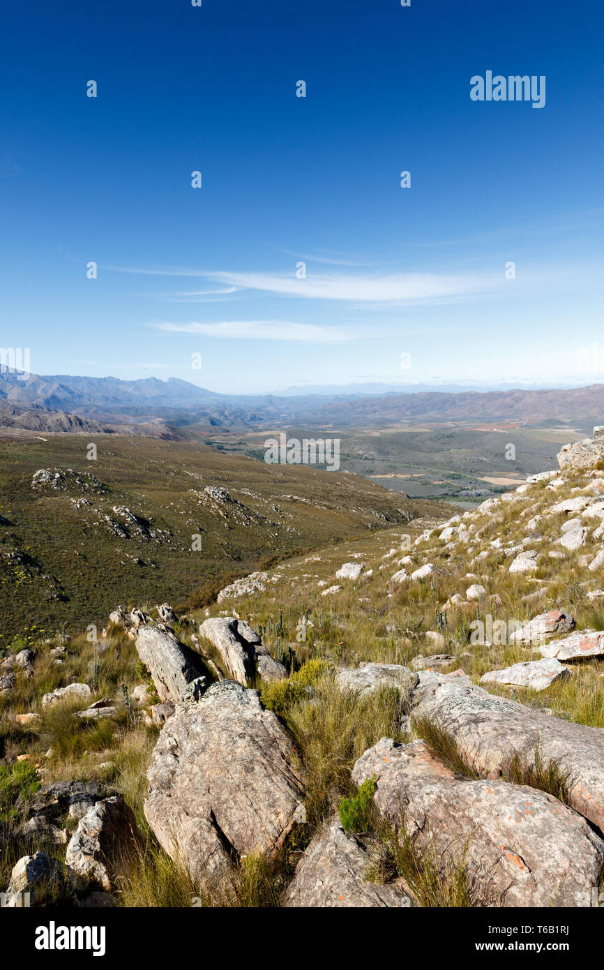 Leading rocks to a valley in the Swartberg mountains Stock Photo