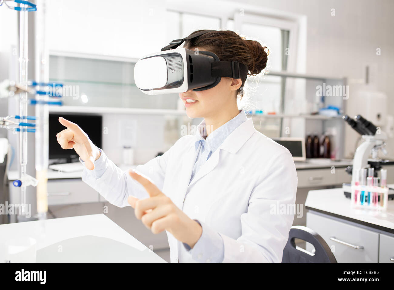 Scientific researcher using virtual reality simulator Stock Photo