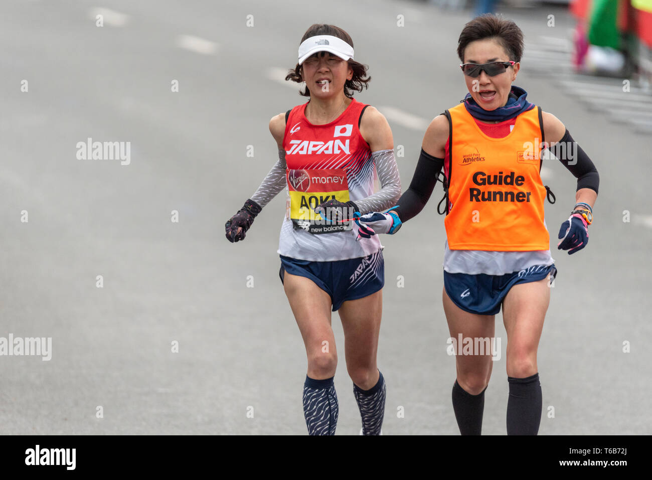 Aoki of Japan racing in the Virgin Money London Marathon 2019 near Tower Bridge, London, UK Stock Photo